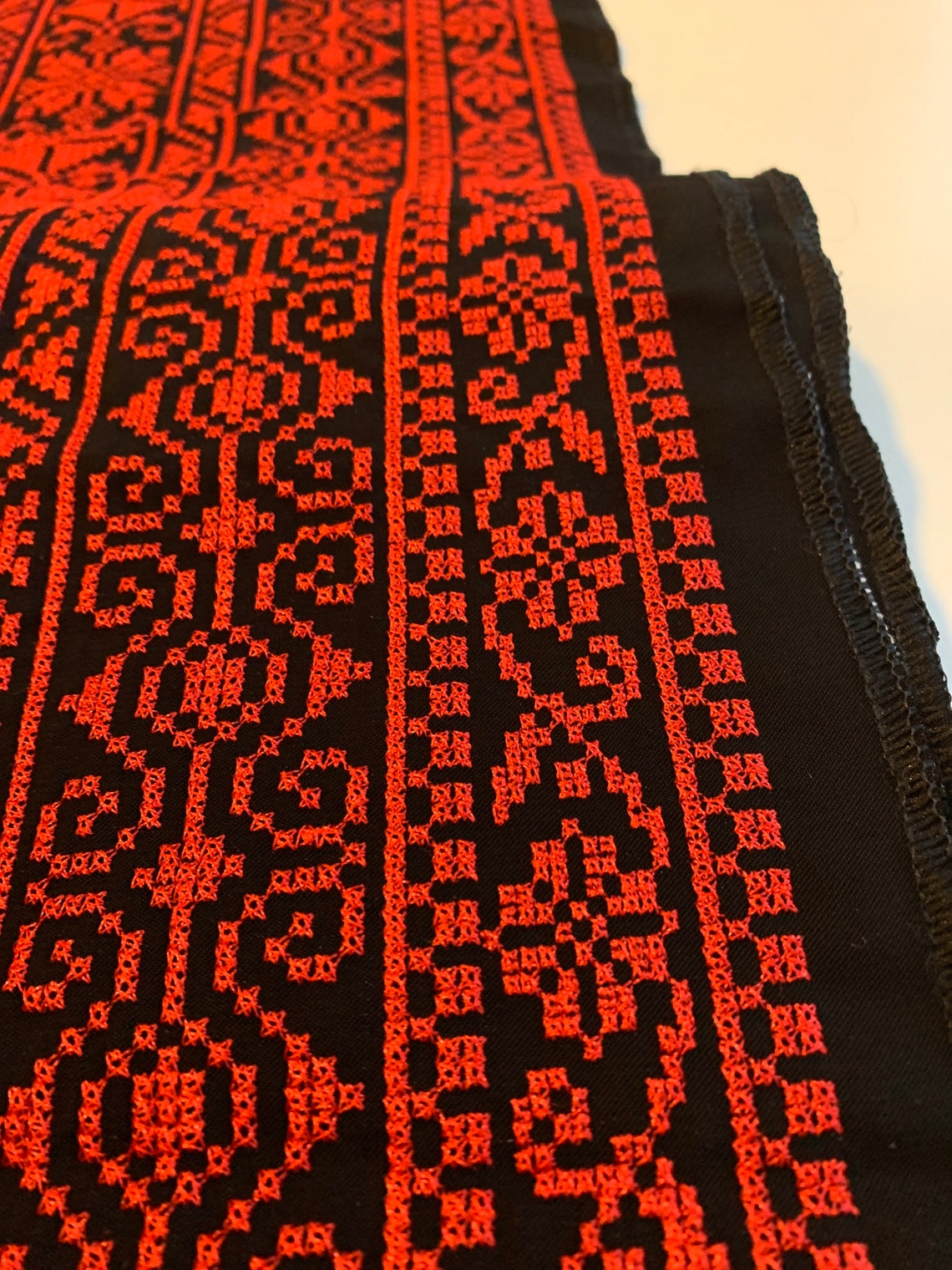 Fabric: Authentic Jordanian Tatreez Cross-Stitch Embroidery, Red/Black. Made in Jordan, Sold by the Yard